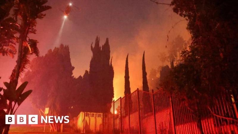 Fires reach Hollywood with fears iconic sign could be at risk