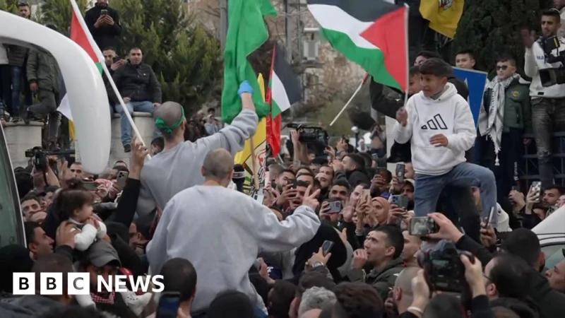 West Bank celebrations as freed Palestinian prisoner return
