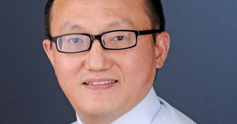 Asian American professor wrongfully accused of spying for China is suing University of Kansas 
