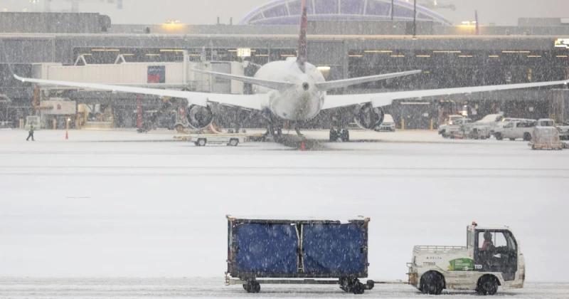 Delta passengers in Atlanta forced to evacuate on emergency slides amid winter storm